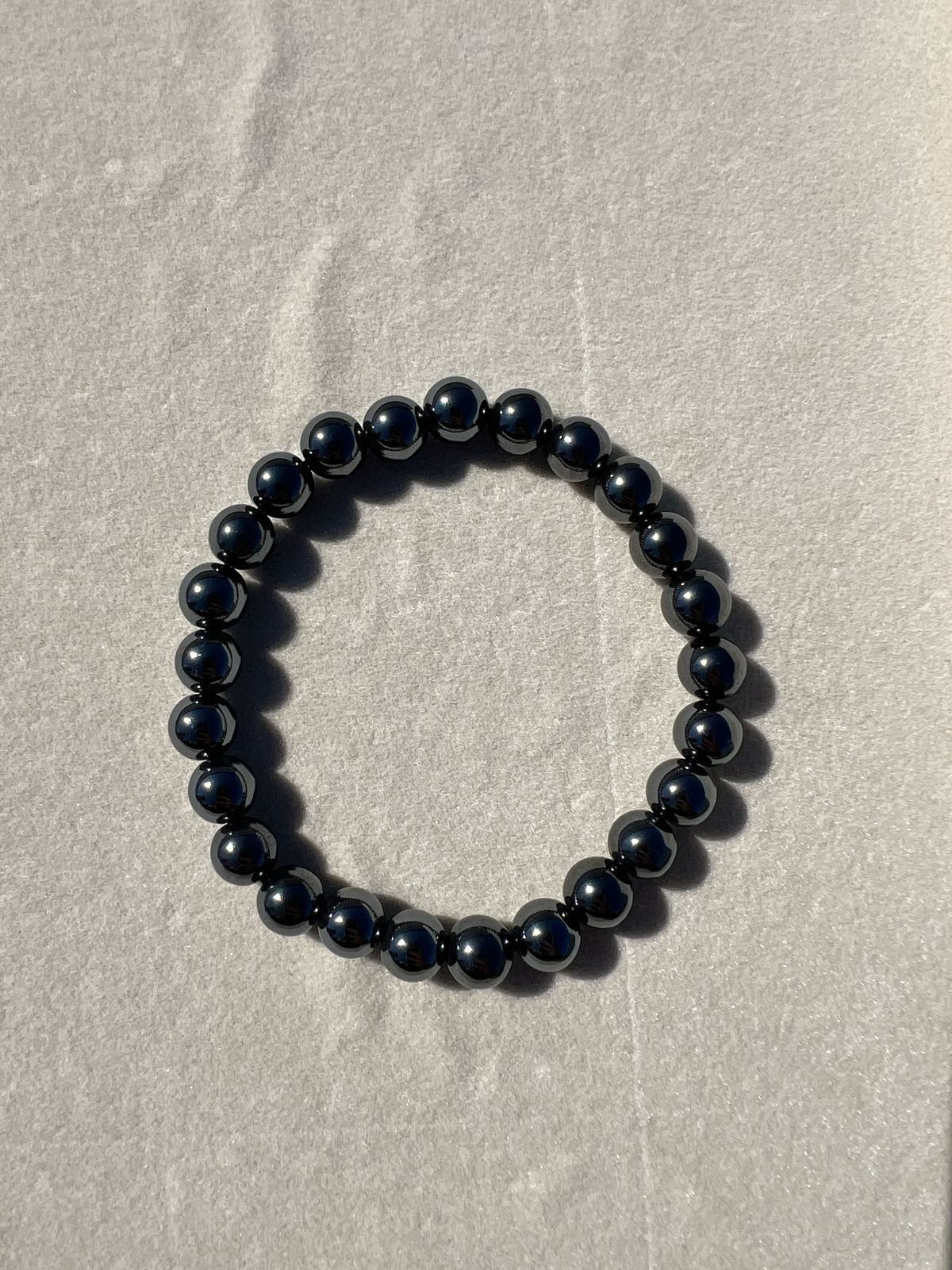 🖤 Hematite – The Stone of Strength and Grounding